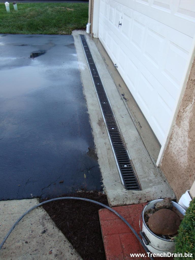 driveway drain installation, installed driveway drain, 
