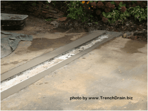 installing econodrain driveway drain, installing residential driveway drain, driveway drainage solutions