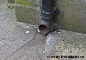 downspout drainage, residential downspout drainage, sidewalk trough drain,